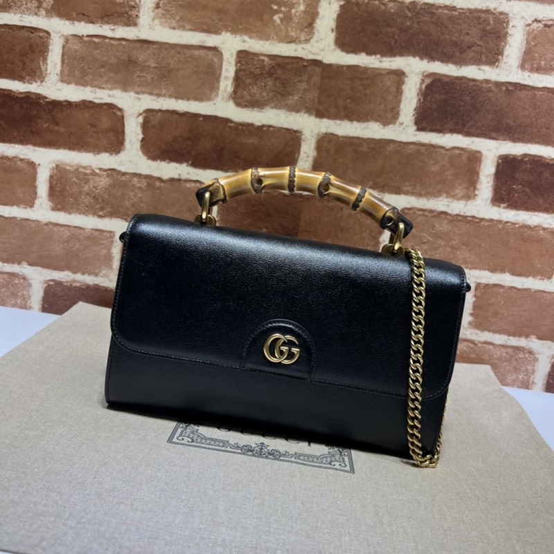 G*u*i top handle bags